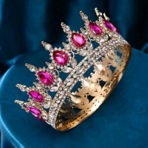 Корона золота з камінням кольору фуксія